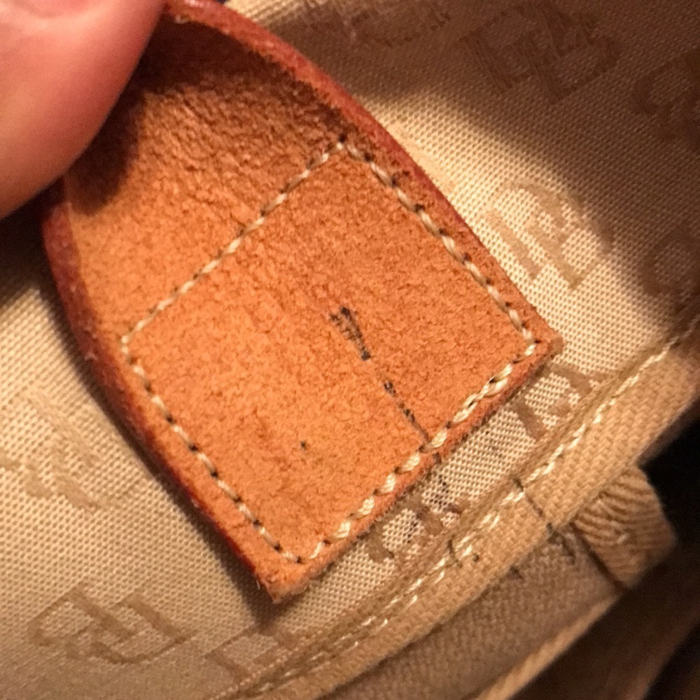 - Very nice Dooney and Bourke Tote! - Picture 12 of 13